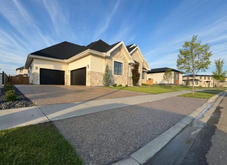 Professional concrete sealing service protecting residential driveway surfaces in Edmonton
