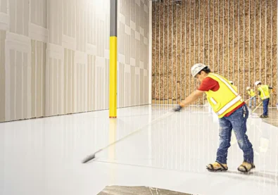 Professional concrete sealing team working in Edmonton