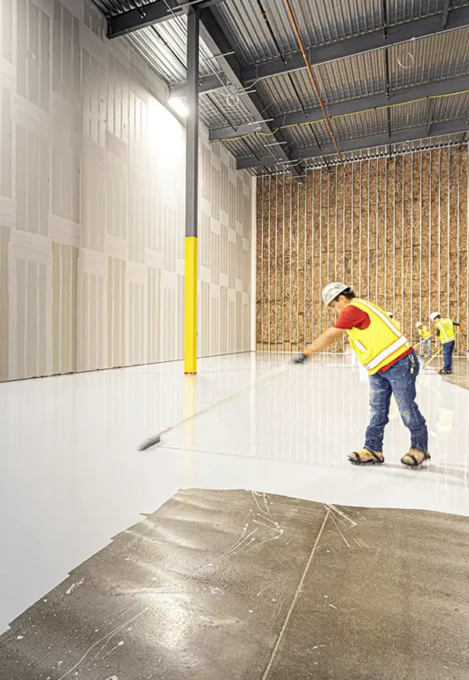 Professional concrete sealing team working in Edmonton